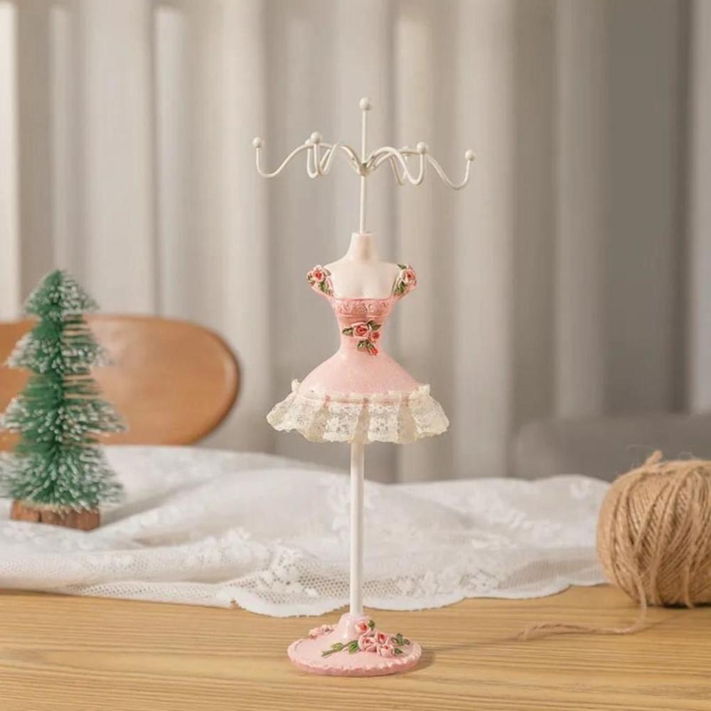 Rotating Jewelry Rack In Pink Dress